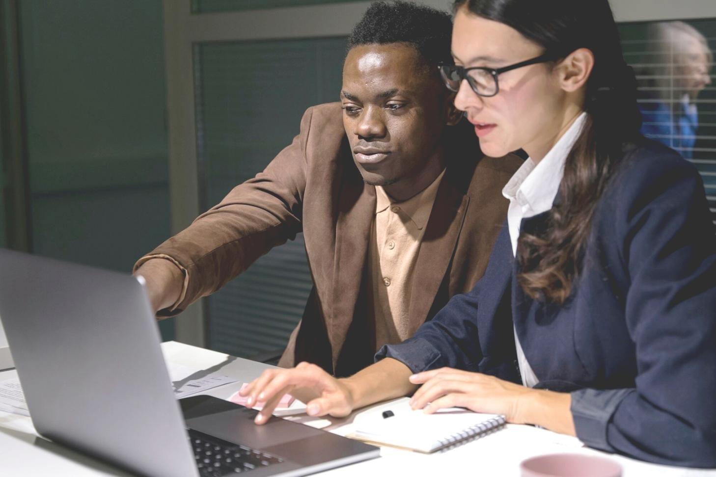 Business owner reviewing financial documents and planning budget allocation strategies